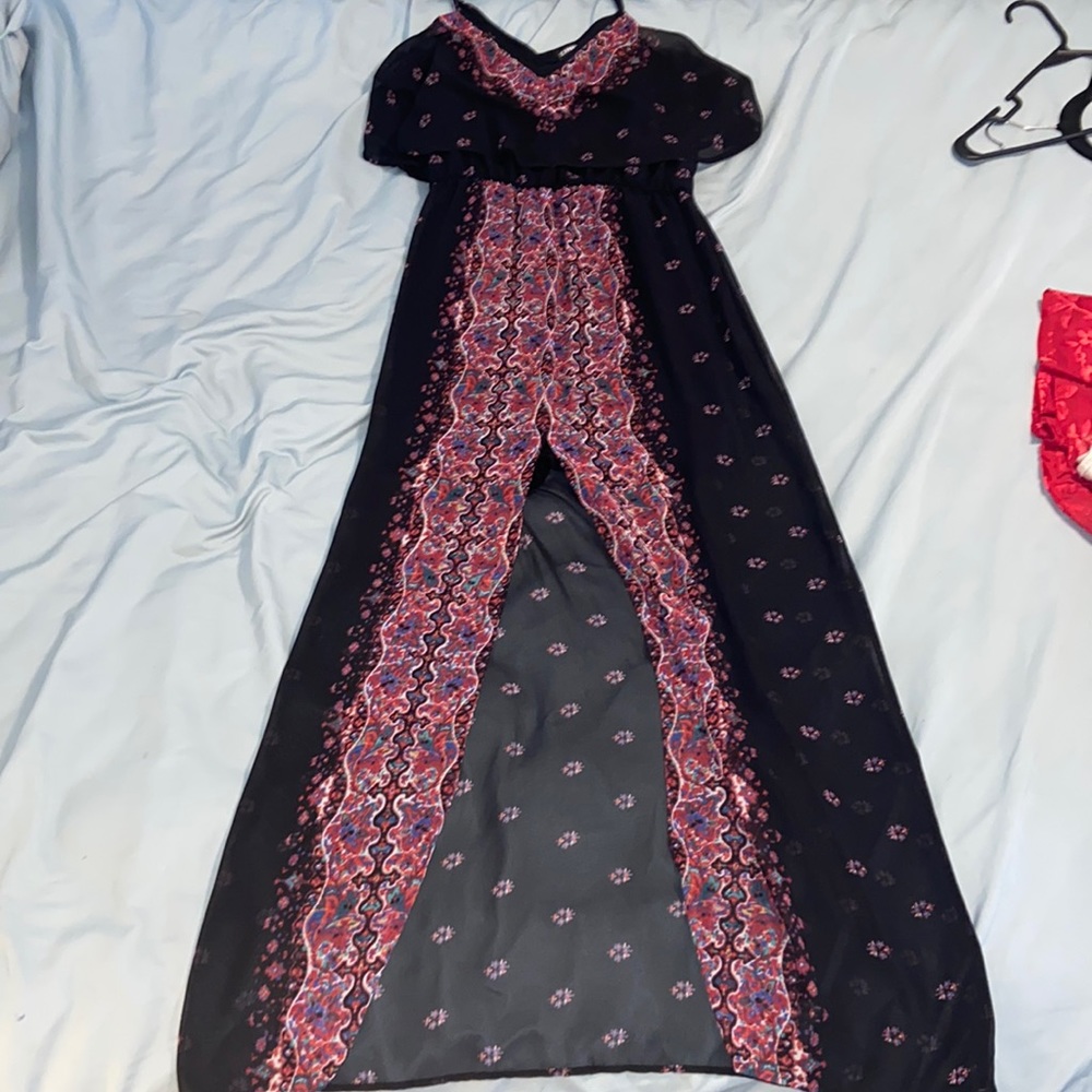 Maxi sheer overlay, black mini hits mid-thigh.
